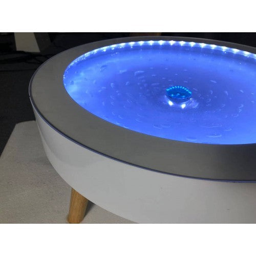 Round light-up side table with blue LED glow top and white base