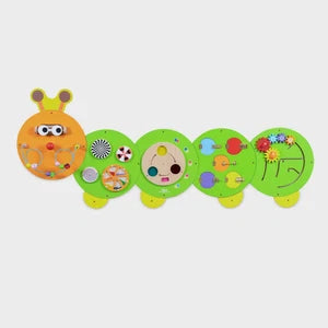 Colorful caterpillar-themed activity wall panels in orange, green, and light purple