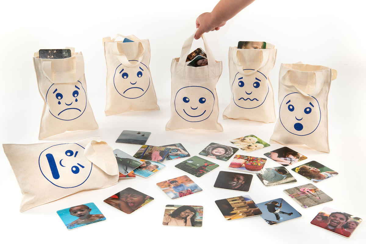 Set of cream canvas sorting bags with blue emotion face prints and cards
