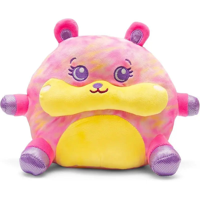 Round pastel plush animal with big purple eyes, yellow snout, and pink-and-gold ears