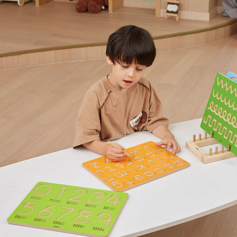 Number tracing board with orange and green number grids and dotted practice rows