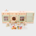 Toddler kitchen starter playset with pastel cabinets, stove, sink, accessories, and pretend foods