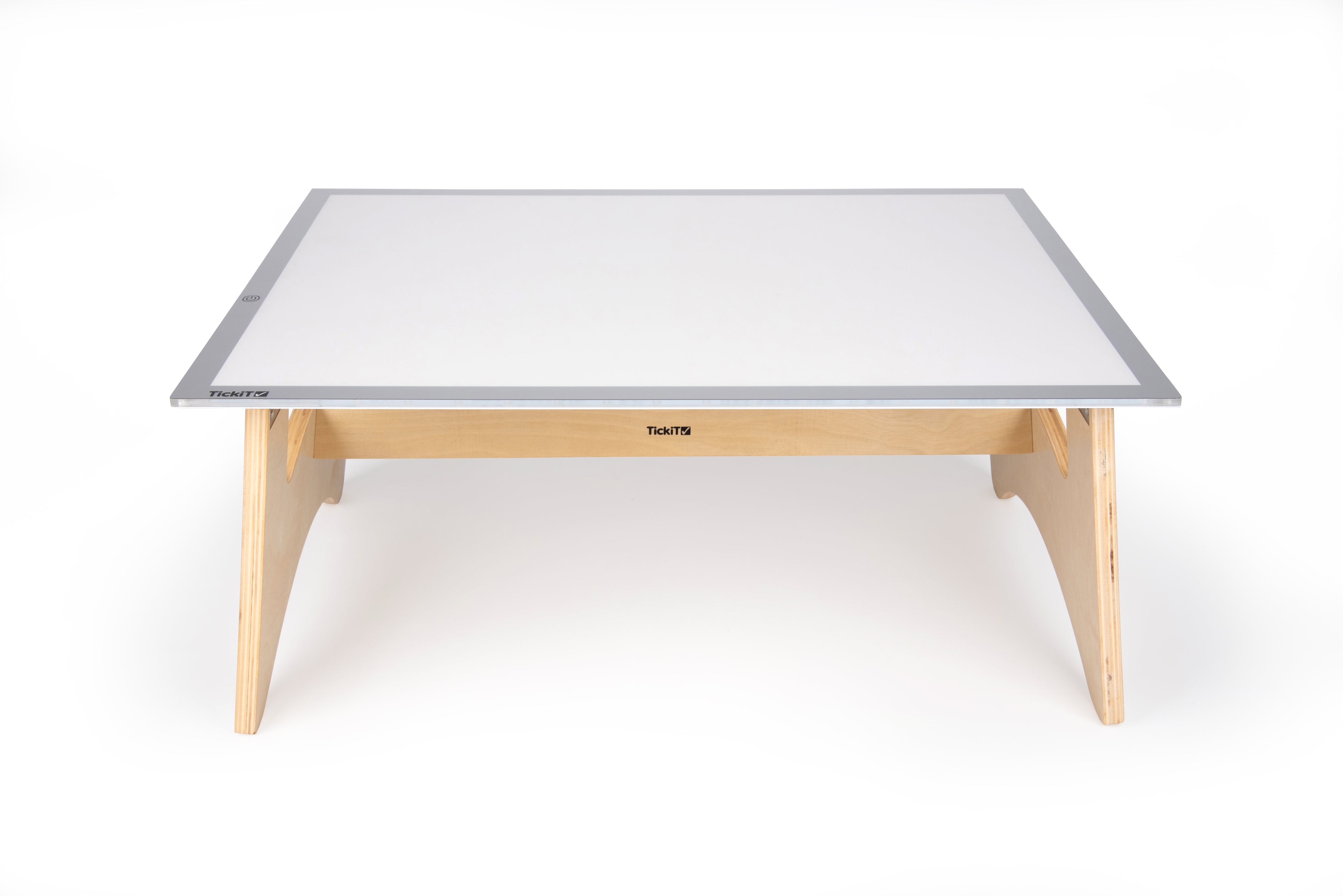 Light panel table set with gray-edged white panel and light wood legs