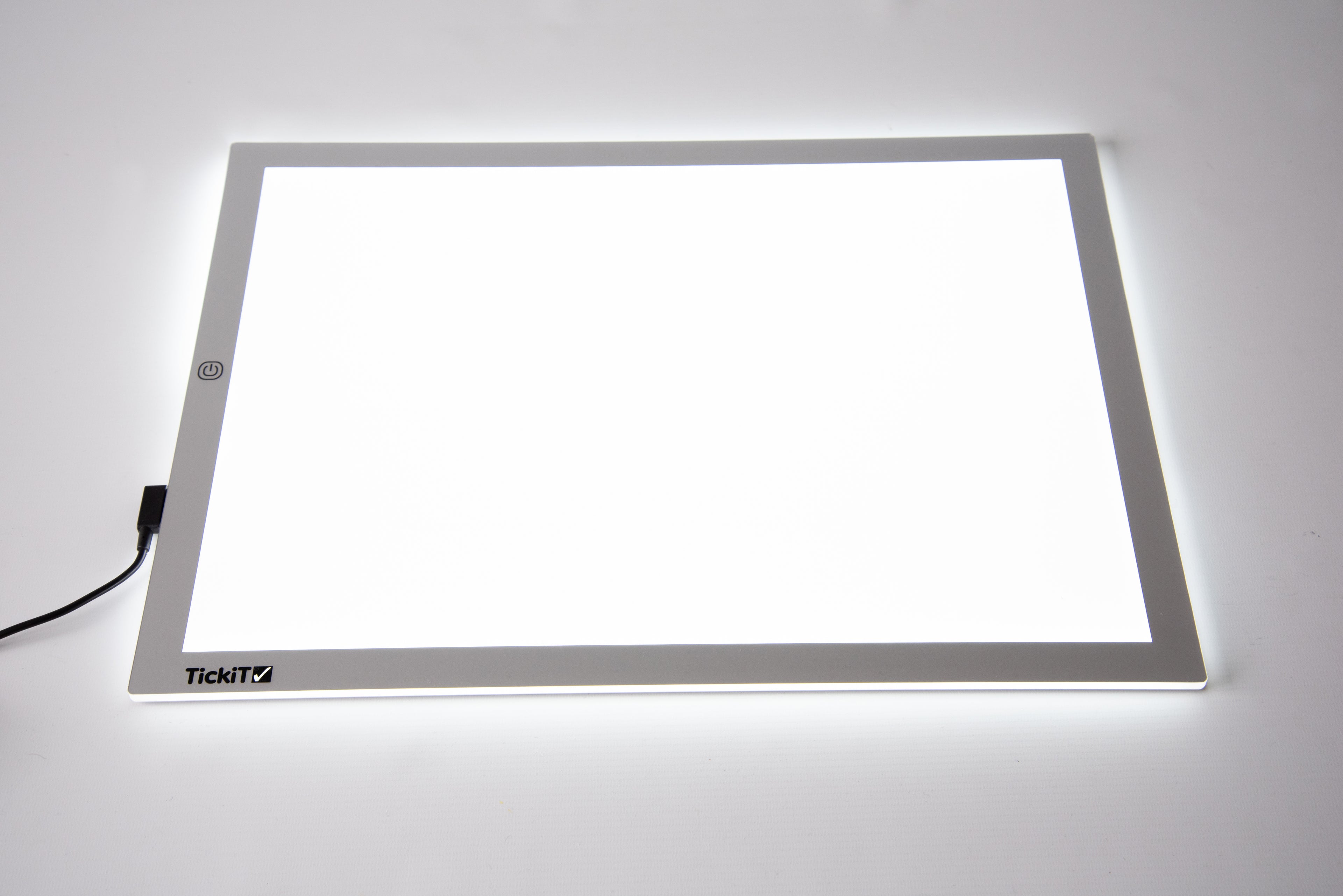 A3 light panel with blank glowing screen and TickiT label