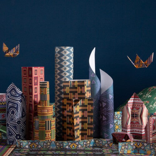 World-themed decorative paper lanterns and folded figures, upright