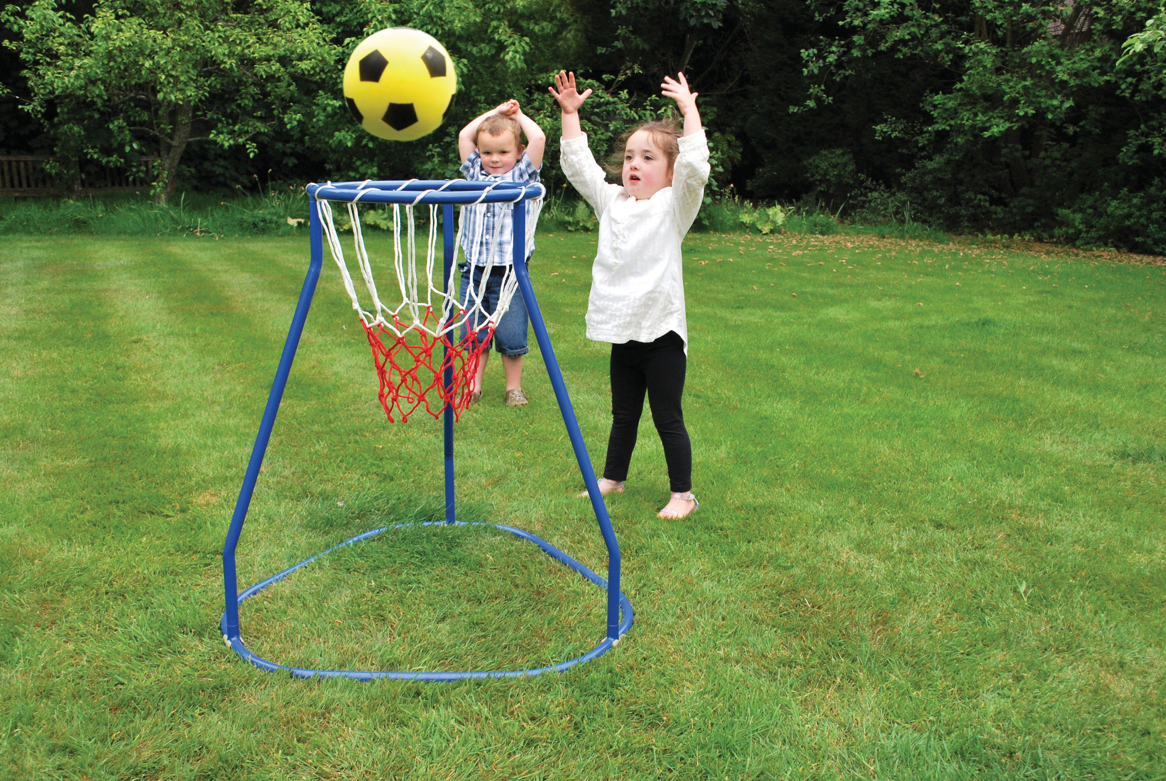 Blue basketball hoop stand with red net and a yellow ball near the rim
