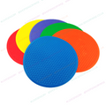 Textured space marker discs in orange, yellow, blue, purple, and green circles