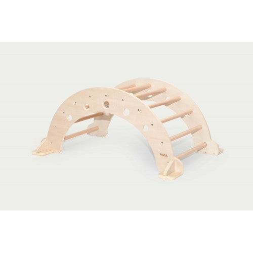 Light wood climbing arch with arched frame and peg-like handholds