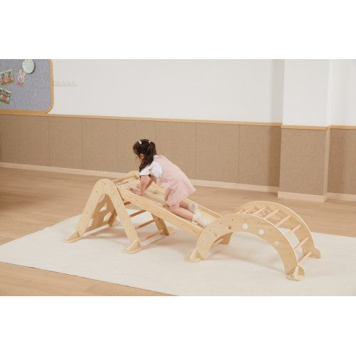 Wooden climbing frame play gym with arch ramp; child climbing on steps