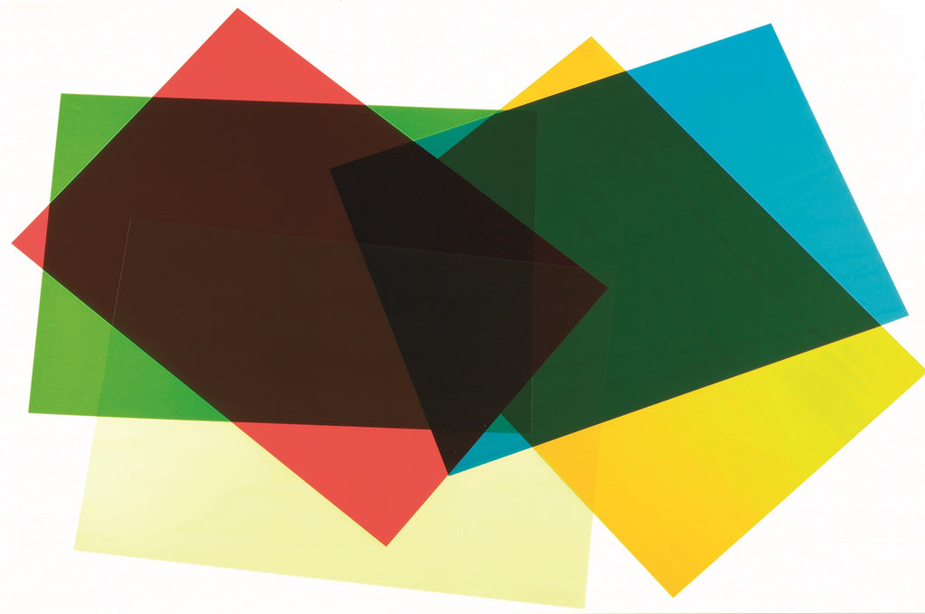 Stacked colored acetate sheets with overlapping transparent shapes in red, green, blue, and yellow