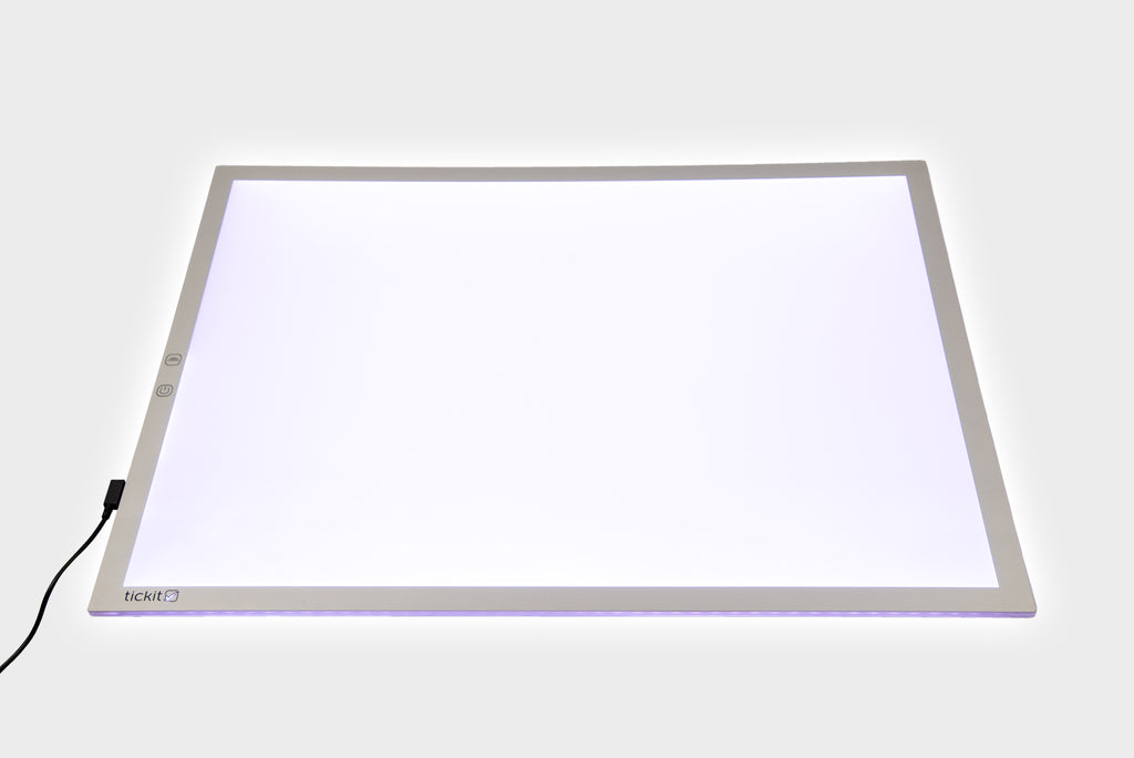 Rectangular color-changing light panel with bright white glow and slim metal frame