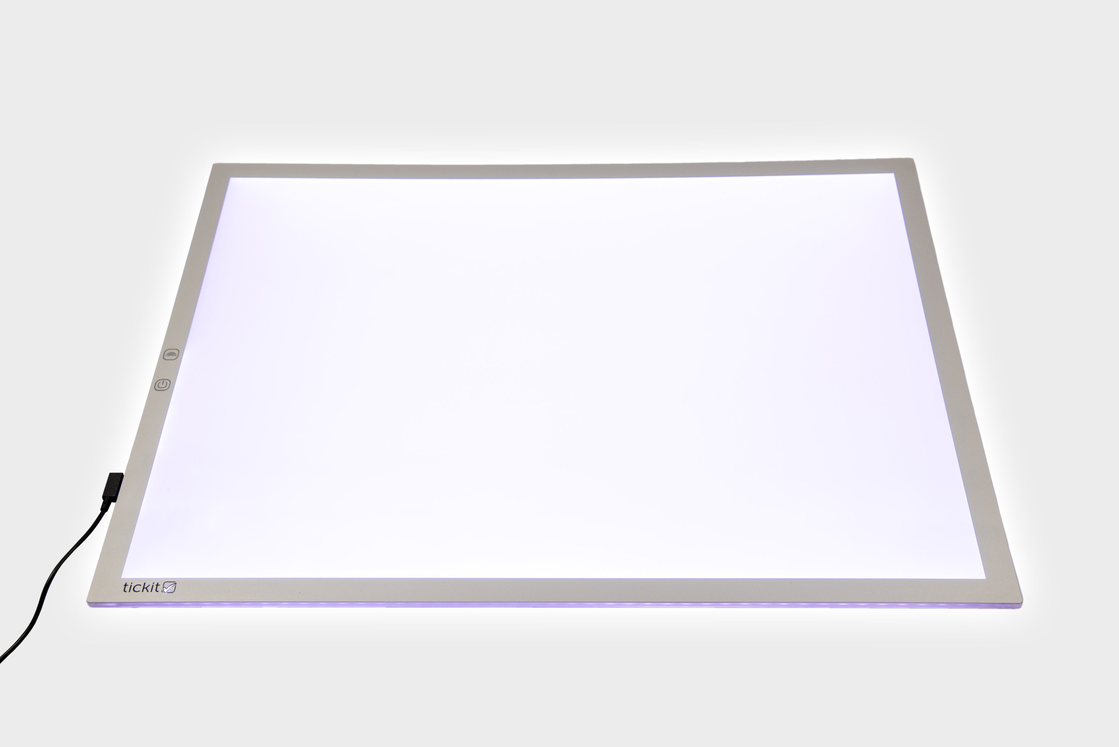 Rectangular color-changing light panel with bright white glow and slim metal frame