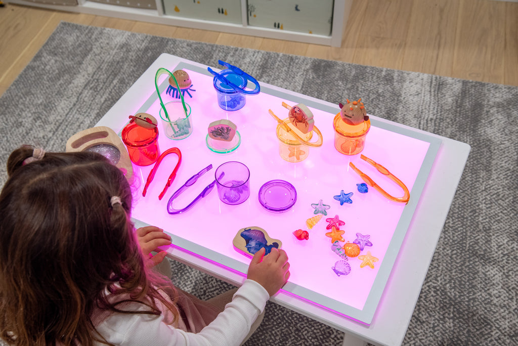 Rectangular color-changing light panel with pink glow and slim metal frame