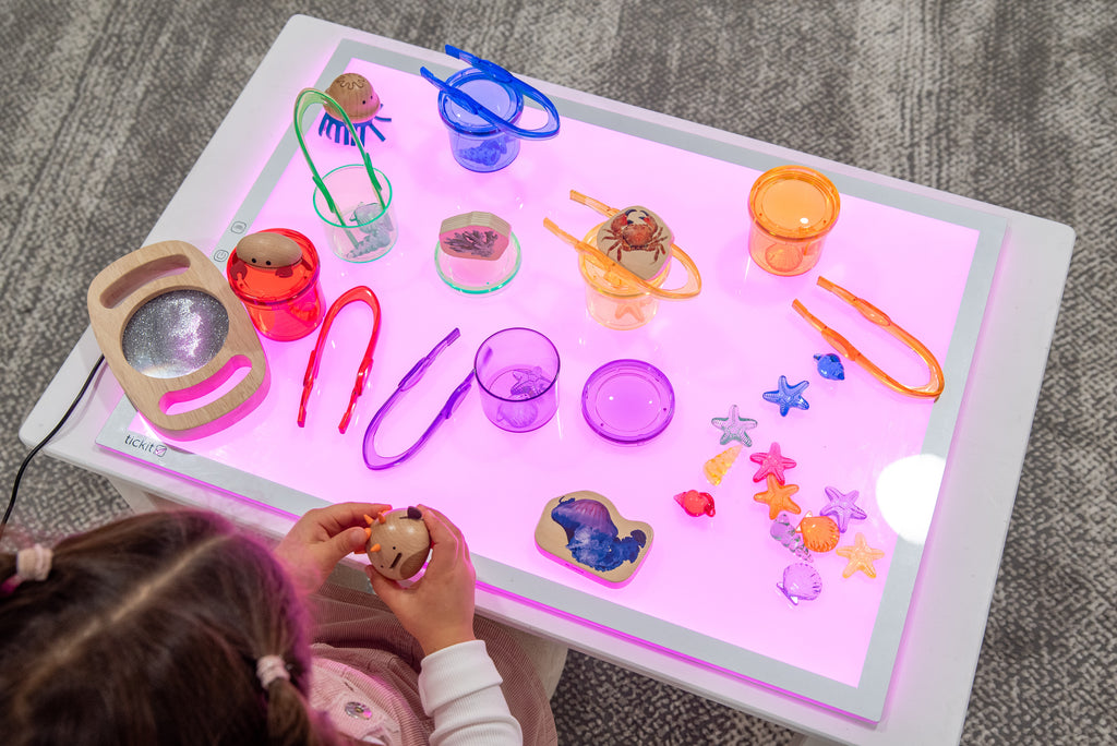Rectangular color-changing light panel with pink-purple glow and slim metal frame