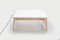Color-changing light panel table set with white panel and natural wood legs