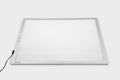 Rectangular color-changing light panel with soft white glow and slim metal frame