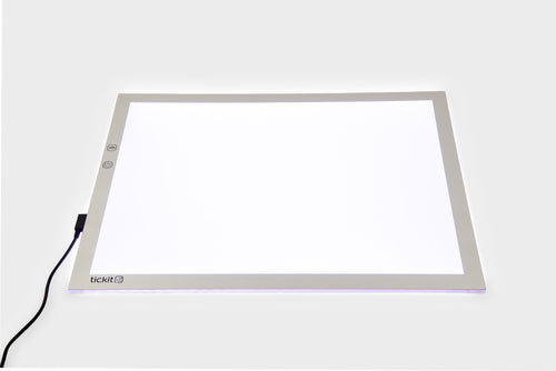 A3 color-changing light panel with black power cable, bright white glow