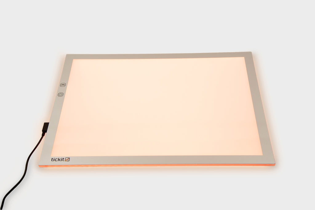 A3 color-changing light panel with black power cable, peach glow