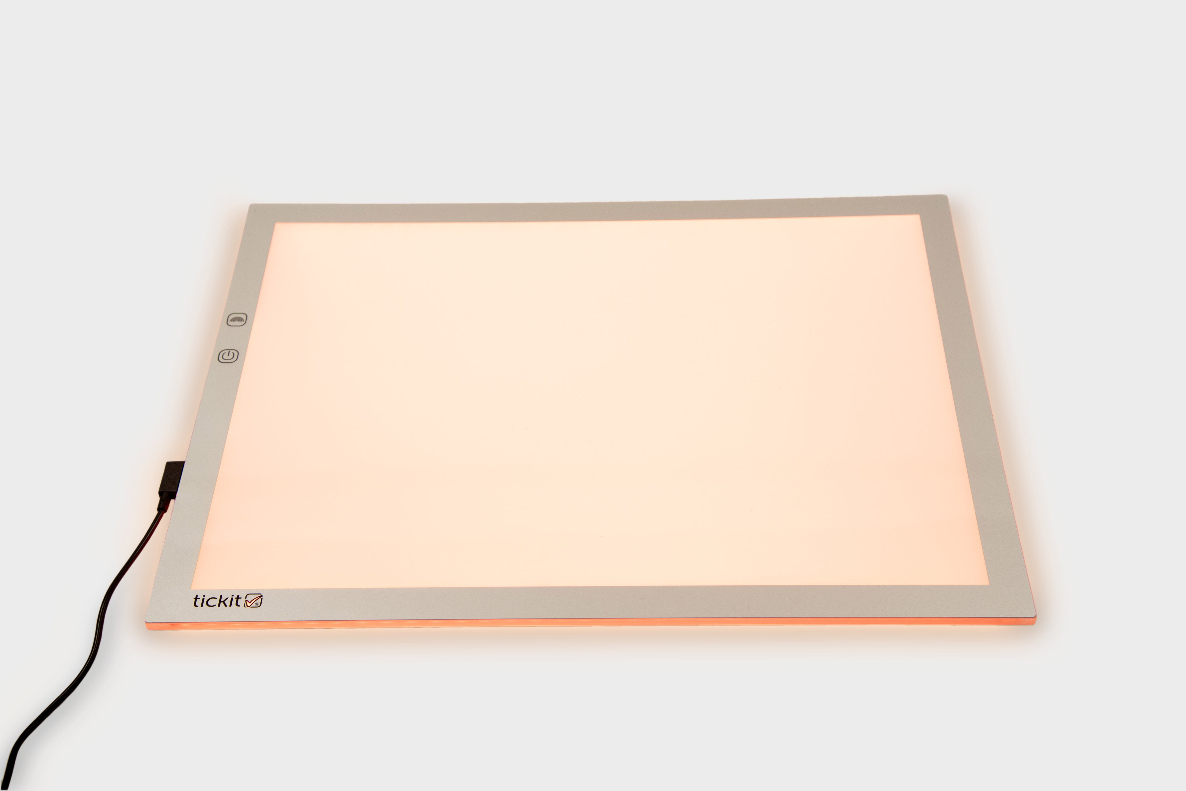 A3 color-changing light panel with black power cable, peach glow