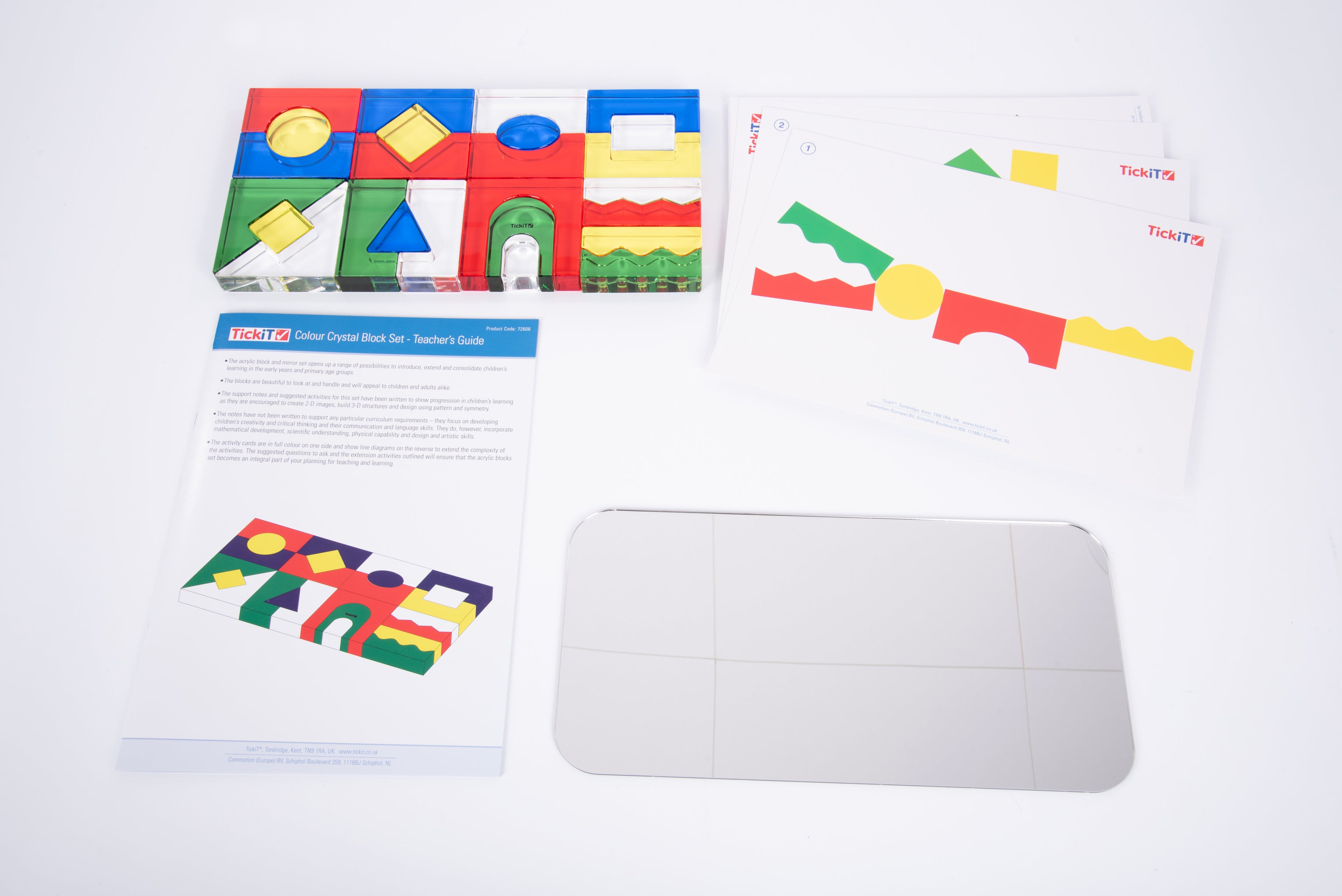 Colorful crystal block tray with white base pieces and instruction cards