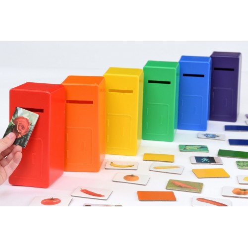 Color posting game with stack of colorful letter bins and assorted cards