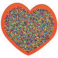 Heart-shaped pile of multicolor rice sprinkles