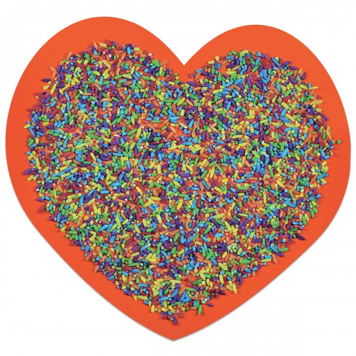 Heart-shaped pile of multicolor rice sprinkles