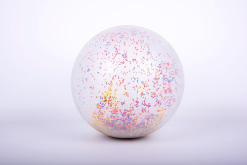 White inflatable confetti-speckled ball, close-up