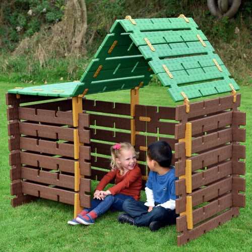 Playhouse cabin with green roof panels and brown wooden-style wall panels