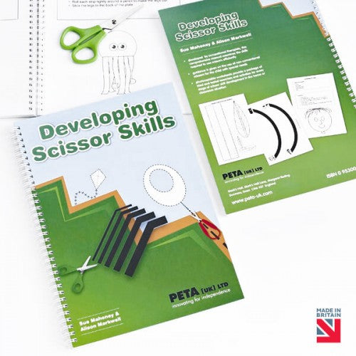 Children's scissor-skills activity book with spiral binding, green cover and cut-out templates
