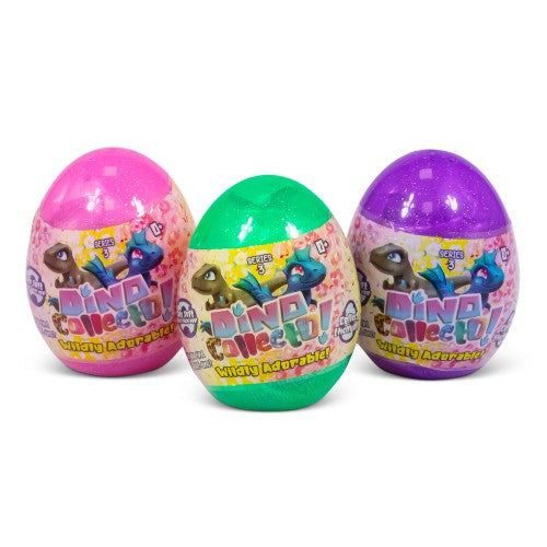 Three Dino Collecto surprise eggs with colorful dinosaur prints, one green and two purple
