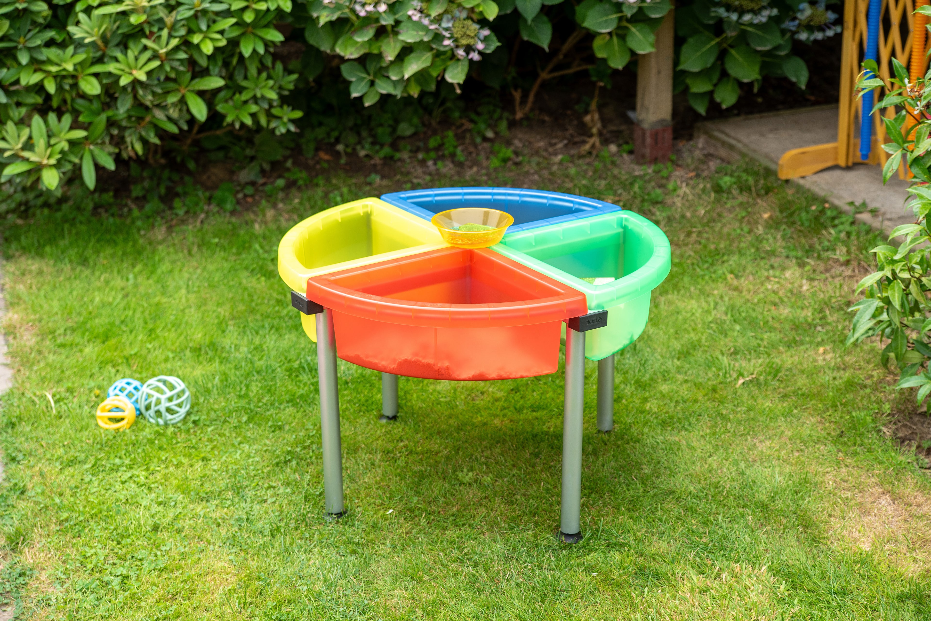 Quadrant color tray set with stand, orange, green, blue and yellow circular bins