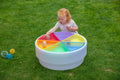 Round plastic color tray set with 6 rainbow compartments for kids to sort pieces