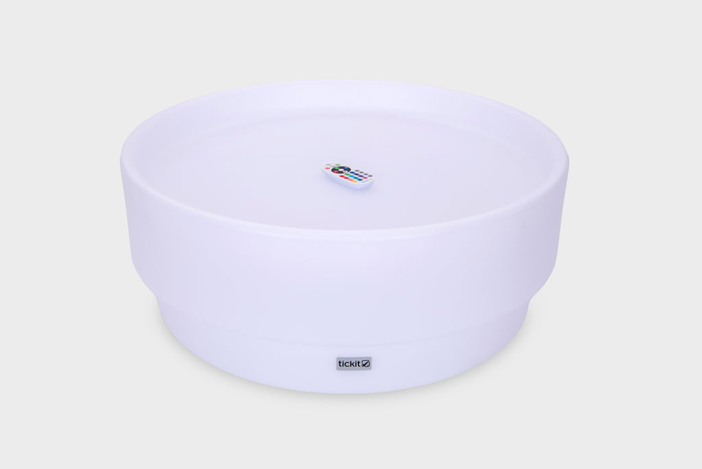 Lavender glow low table with small remote control on top