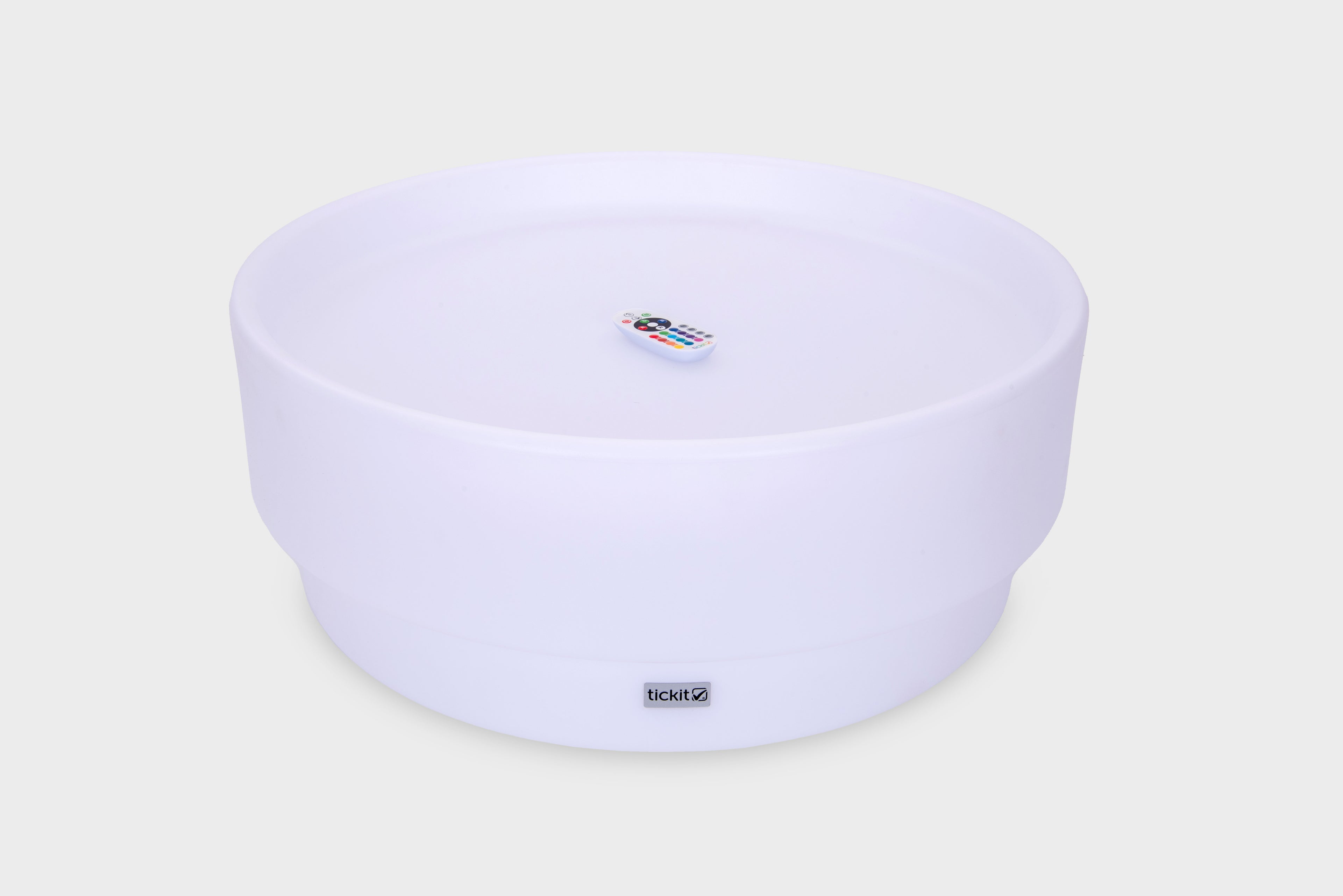 Lavender glow low table with small remote control on top