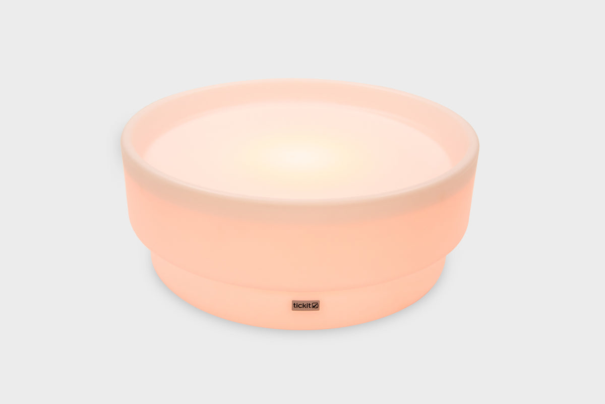 Peach pink glow low table with round softly lit base