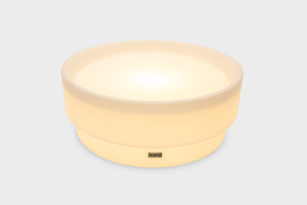 Warm beige glow low table with softly lit round surface