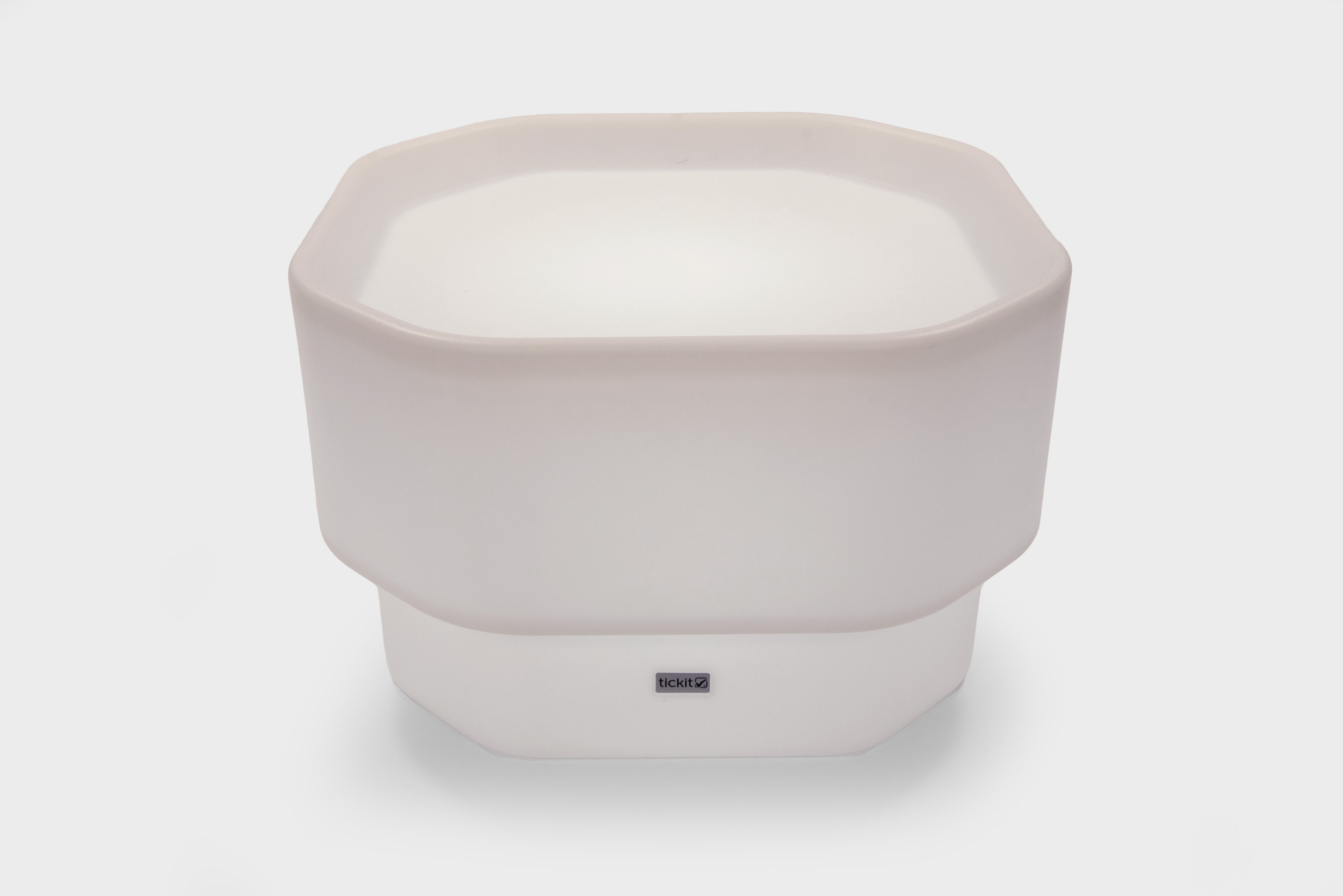 White mini round table with glow base and small center logo