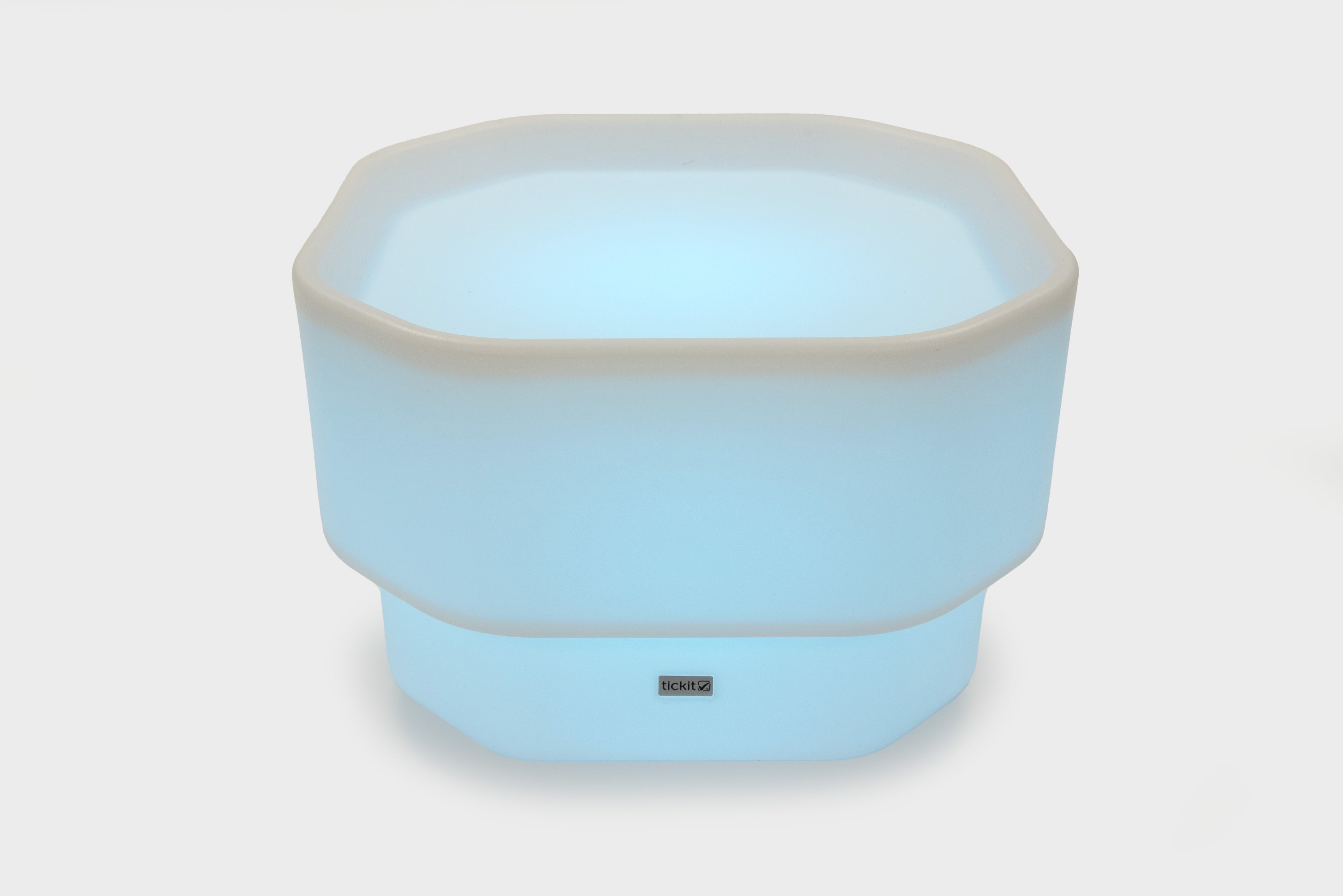 Light blue mini round table with glow base and small center logo