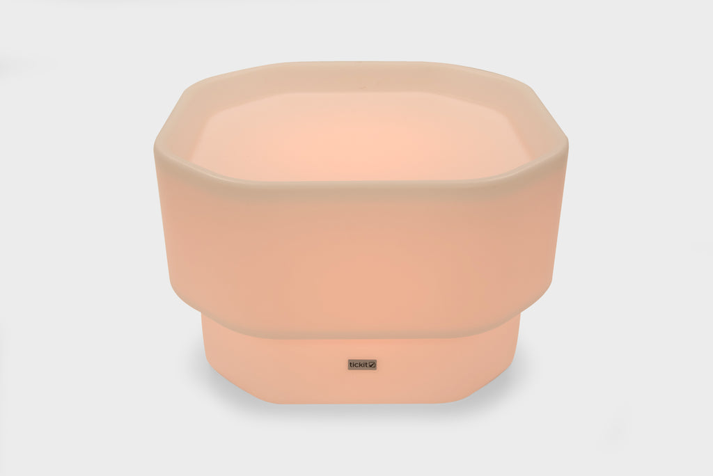 Peach mini round table with glow base and small center logo