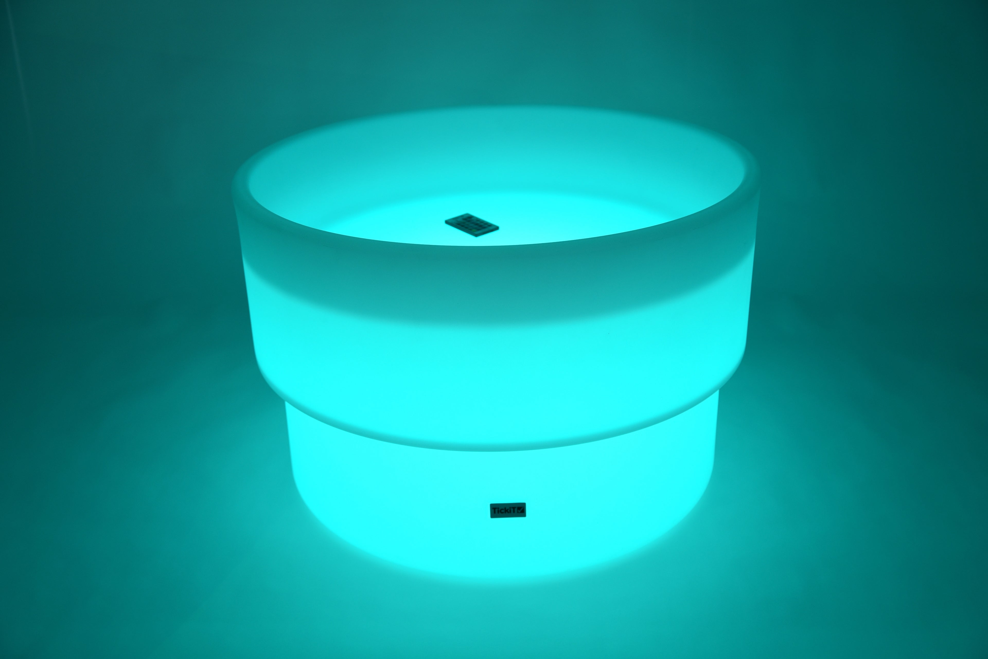 Glowing LED water table, teal light, round top