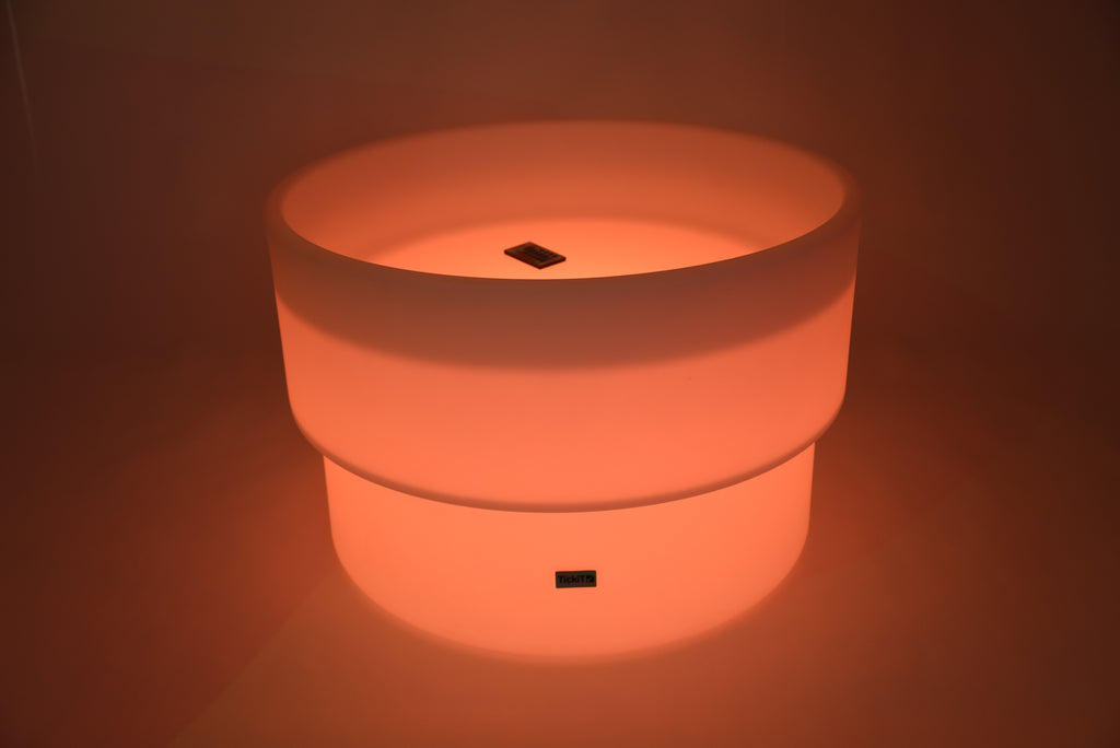 Glowing LED water table, orange light, round top