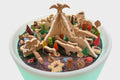 Round dinosaur playset tray with detailed prehistoric figures, stones, and plants