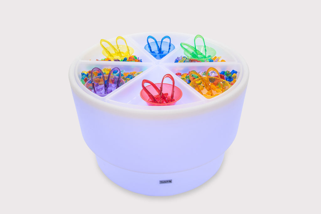 Light blue round sorting table with clear lid and five compartments for toys and beads
