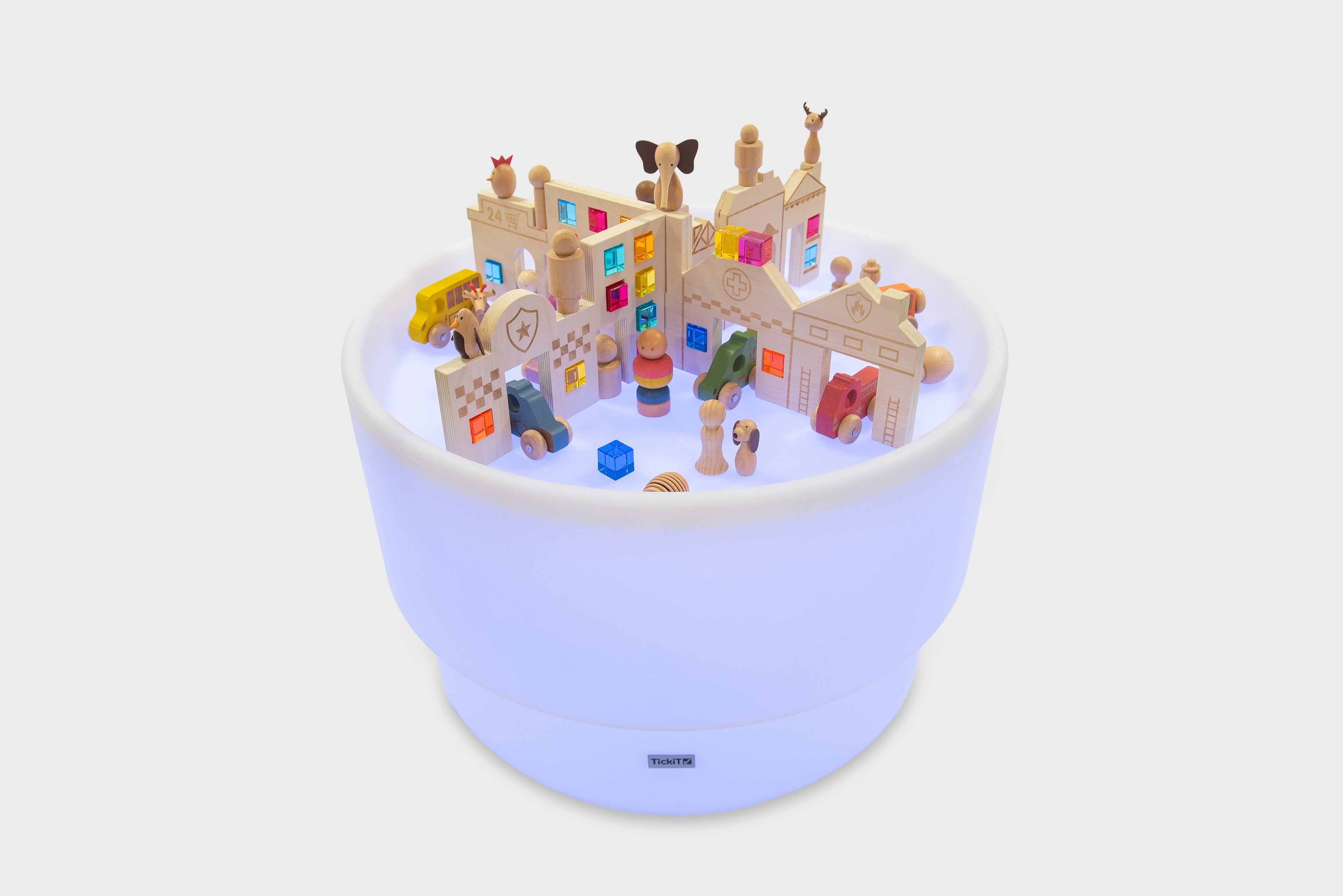 Discovery Town play table with miniature town buildings, vehicles, and character figures