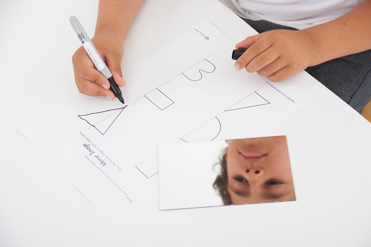 Double-sided mirror sheet, 150 x 100 mm, traced shape outlines with a marker