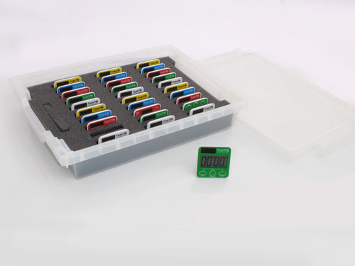 Timer class set with storage tray and multiple colored digital timer displays, plus green unit