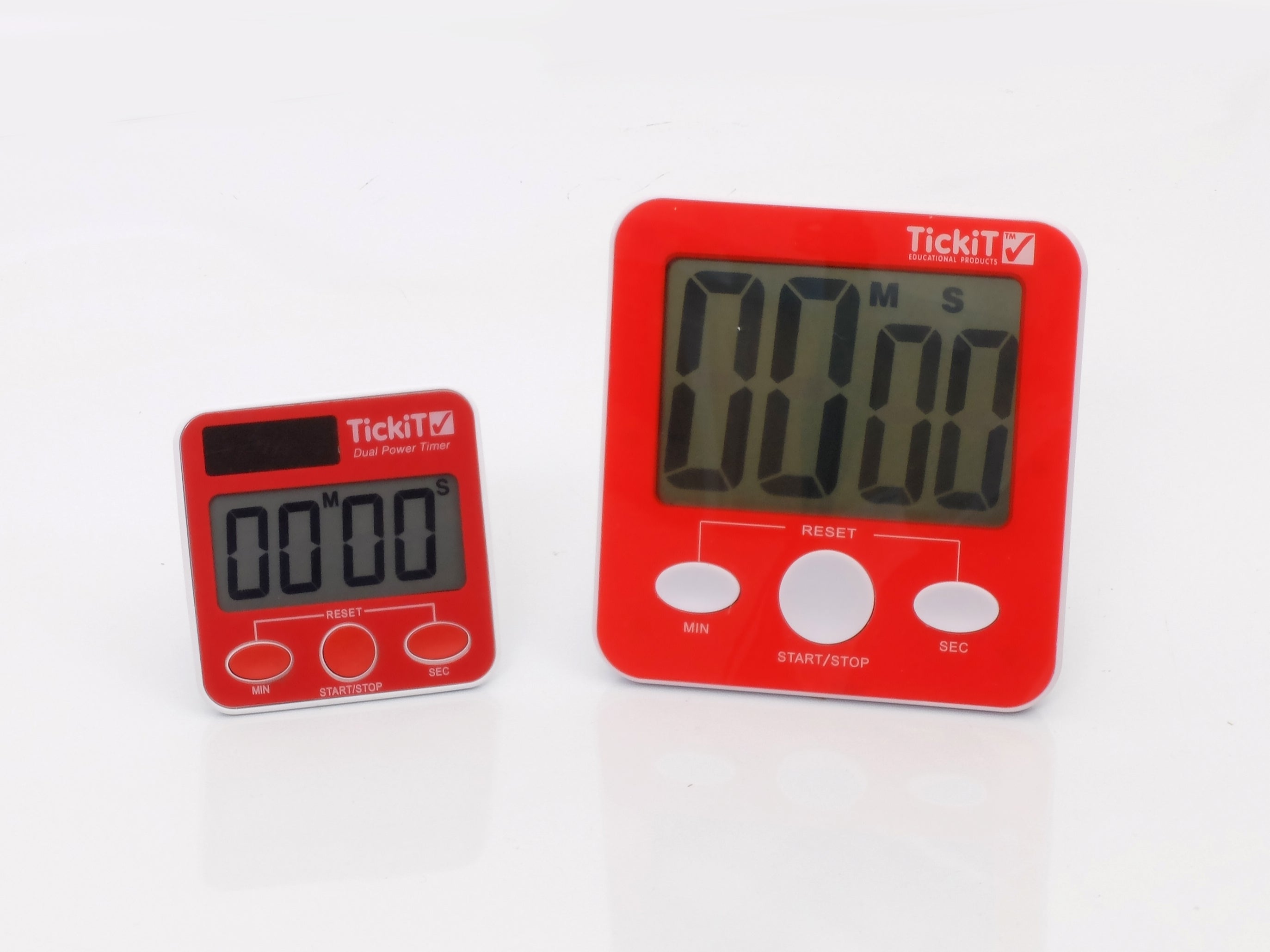 Dual power digital timers in red, close-up of LCD displays and button controls.