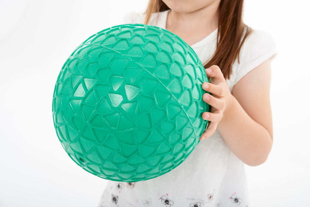Large green textured grip ball with raised bumpy pattern