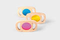 Set of wooden color panel frames with translucent blue, yellow, and pink windows